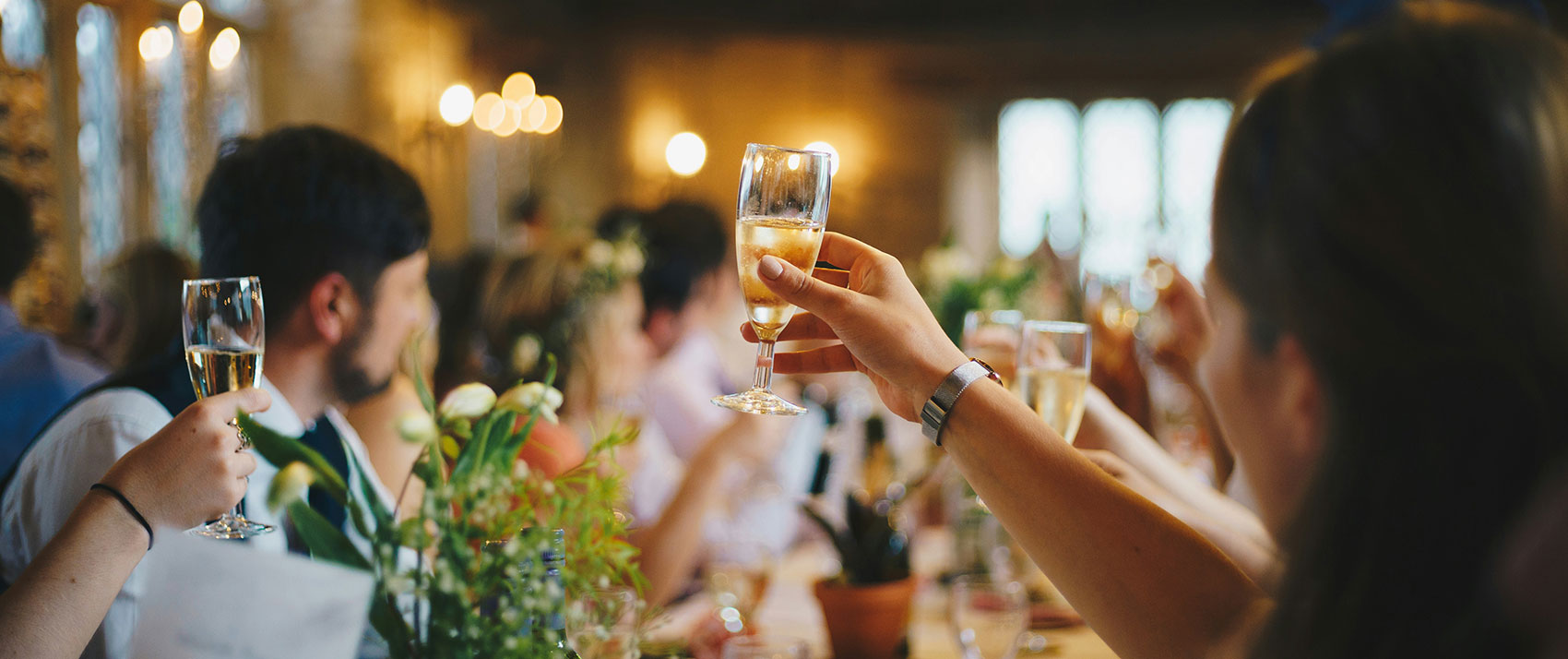 wedding guests toasting